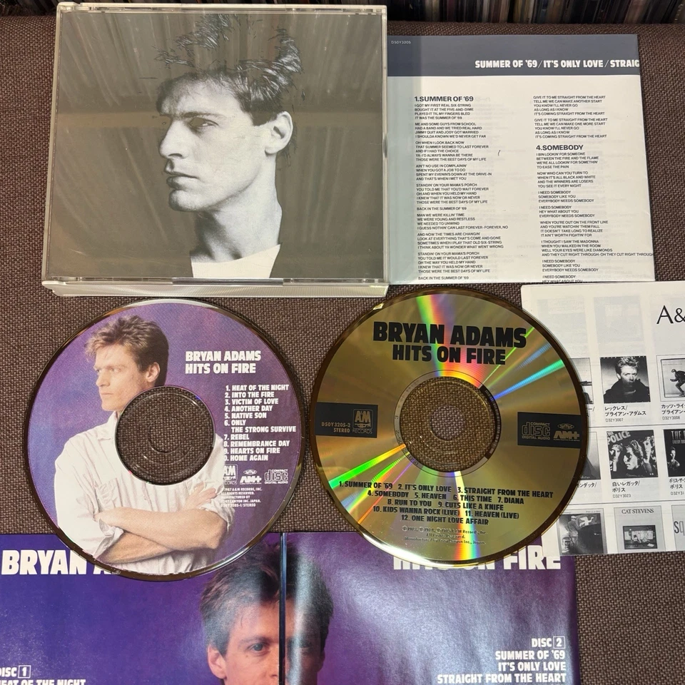 BRYAN ADAMS Hits On Fire JAPAN-ONLY 24k GOLD CD D50Y3205 w/ JAPANESE INSERT - Image 1 of 4