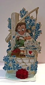 Vintage German Valentine 3-D Pop Open Die Cut Card Watering The Garden - Imagen 1 de 5
