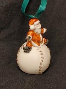 Hand painted porcelain Santa on baseball Ornament - Picture 1 of 3