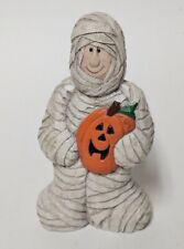 Mummy holding a Pumpkin - Eddie Walker - Midwest of Cannon Falls
