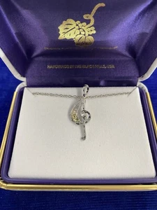 Black Hills Gold sterling silver and gold treble clef necklace by Landstroms - Picture 1 of 3