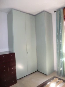Vendo due armadi usati ad "L" ditta MOLTENI, laccati, colore verde acqua marina. - Foto 1 di 4