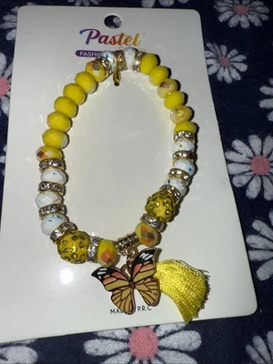Pulsera expandible de cristal amarillo, blanco y dorado Foto 1 de 4
