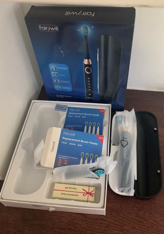 Cepillo de dientes eléctrico recargable Fairwill 5 modos 10 cabezales de cepillo Dupont + estuche Foto 1 de 1