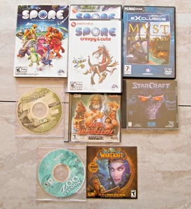 VINTAGE PC CD-Rom Games,some manuals,Spore,Starcraft,Myst,Warcraft,Zootycoon - Picture 1 of 11