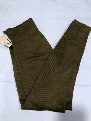 Pantalones ajustados H&M para mujer talla M marrón textura zig zag Foto 1 de 4