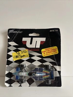 F1 BENETTON - M SCHUMACHER - UT MODELS PULL BACK 1/43 SCALA - BLISTER PACK NUOVO - Immagine 1 di 4