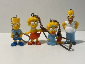 Simpsons Bully Bullyland 4 x Figur Anhänger 1991: Bart,Lisa,Maggie,Homer Simpson - Bild 1 von 3