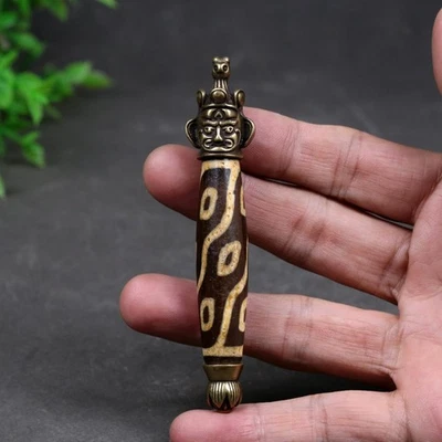 Amuleto de cuentas de talismán de 9 ojos antiguo Dzi del Himalaya nepalí tibetano 高油镶嵌9眼天珠护身符 Foto 1 de 4