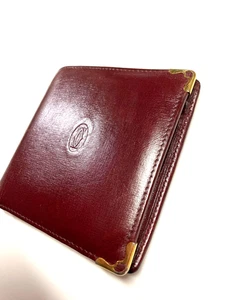 CARTIER VINTAGE MUST CC GEPRÄGTES LEDER GELDBÖRSE FALTBAR MÜNZE SPANIEN BURGUNDERROT - Bild 1 von 24