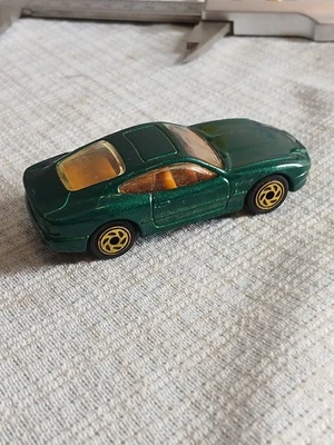 Matchbox 1994 Aston Martin DB7 Green Diecast Loose No Packaging Gold Rims - Image 1 of 4