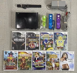 Nintendo Wii Console With 9 Games + 2 Controllers - Picture 1 of 8