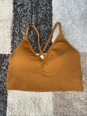 Sujetador deportivo DSG para mujer talla pequeña mostaza sin costuras sujetador con tiras soporte bajo Foto 1 de 4