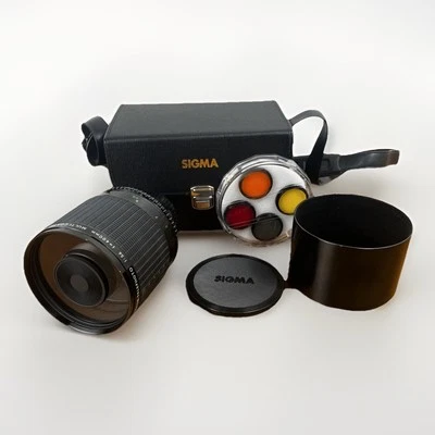 Lente teleobjetivo espejo SIGMA 1:5,6 f=400 mm con estuche y accesorios montaje MC Foto 1 de 4