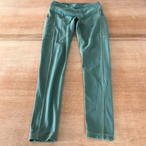 Leggings Prana Electa para mujer XS verdes tiro medio bolsillo multimedia elástico ocio - Imagen 1 de 15