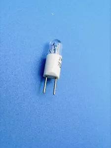 7001 Incandescent Lamp Clear 24V Round with Domed Top RT-1 3/4 Radial - Bi-Pin - Picture 1 of 2