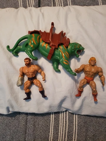 He-Man Masters of the Universe 1978 Battlecat, 1981 He-Man, and 1983 Fisto Cover