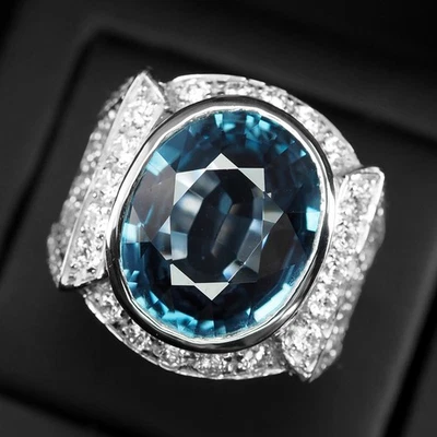 Anillos clásicos enchapados en oro blanco de plata de ley 925 de 19 quilates con topacio azul de Londres Foto 1 de 4