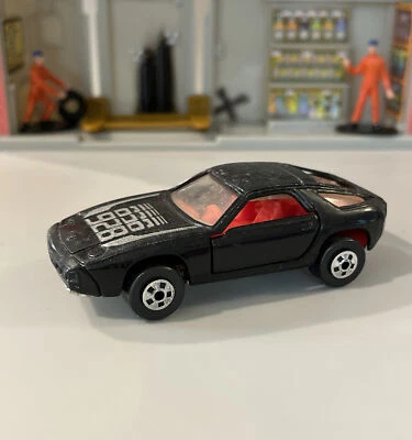 Vintage 1983 Porsche 928 Hong Kong Rally Black 1:64 Diecast Car - Image 1 of 4