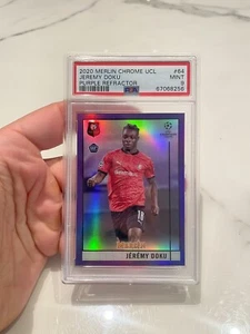 2020-21 Merlin UEFA Champions League Purple Refractors RC /299 Jeremy Doku - Picture 1 of 2