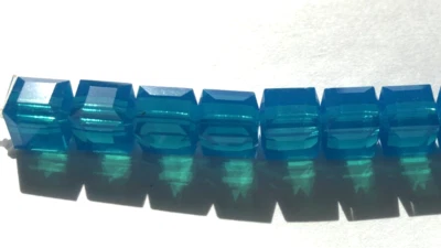 施华洛世奇水晶立方体 8 毫米 (288 件/FP) 加勒比蓝色蛋白石 #5601 — 第 1/3 张图片