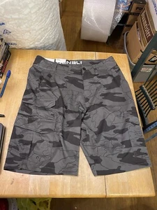 Denali Men's Stretch Hybrid Walk Cargo Shorts Jigsaw Camo 34 NWT - Picture 1 of 9