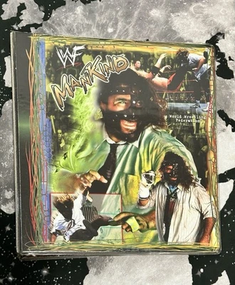Carpeta facial sonriente WWF World Wrestling Federation Mankind Have A Nice Day Foto 1 de 4