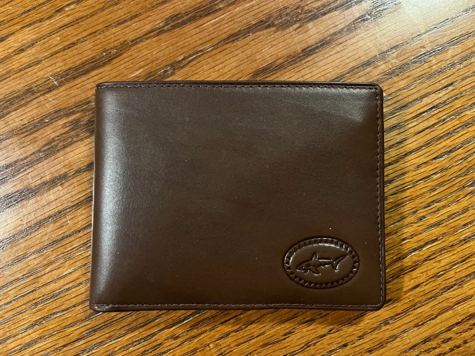 Cartera de cuero marrón Greg Norman vintage.  Nuevo con etiqueta.  El precio de venta es de $50. Foto 1 de 4