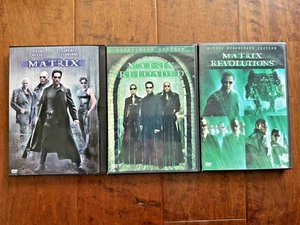 The Matrix (DVD) + Matrix Reloaded (2DVD) + Matrix Revolutions (2DVD) Lot! - Bild 1 von 5