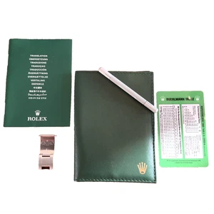 KIT DE HERRAMIENTAS BILLETERA ROLEX GREEN SEA-DWELLER CON HERRAMIENTA 2100 Y TARJETA DE MESA BUEHLMANN - Imagen 1 de 8