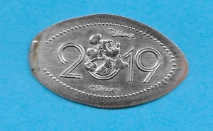 2019 CLASSIC MICKEY WELCOME a DISNEY WORLD PRESSED QUARTER DISNEY NO PENNY - Foto 1 di 1