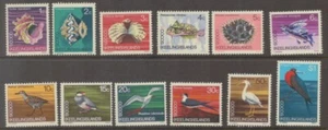 1969 Juego definitivo de 12 estampillas MUH de aves y vida marina islas Cocos - Imagen 1 de 1