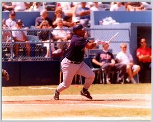 Vintage Baseball Photograph Of Kirby Puckett Mid-Swing In Striped Pants - Picture 1 of 2