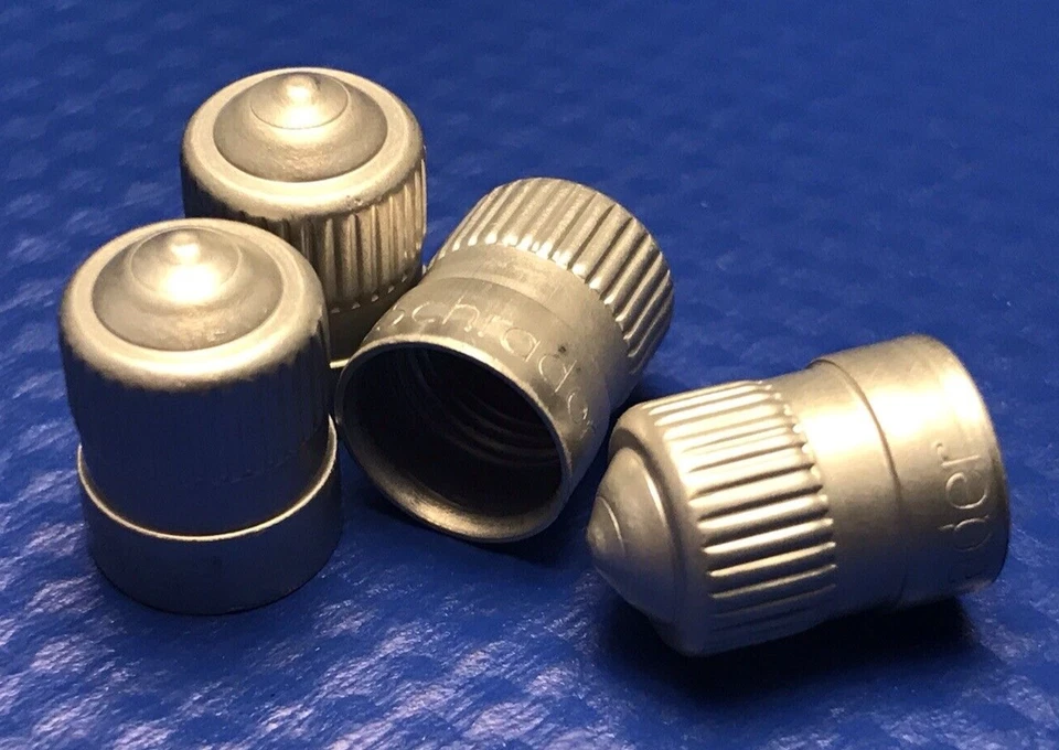 Schrader  Valve Stem Caps Schrader  USA       8 caps - Image 1 of 1