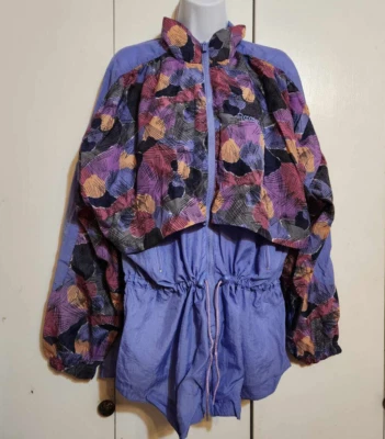 Chaqueta cortavientos vintage años 90 para mujer grande Reebok púrpura estampado geométrico cremallera completa Foto 1 de 4