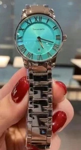 PREOWNED W/O WORN TIFFANY Co. ATLAS SERIES BLUE DIAL STEEL BAND WOMEN'S WATCH - Picture 1 of 3