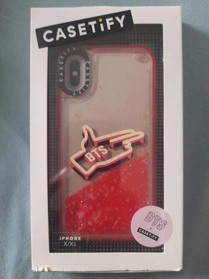 Funda de teléfono BTS Casetify Glitter Apple iPhone Xs. Rojo, dorado y rosa - Señalando a mano Foto 1 de 4