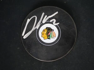 DUNCAN KEITH SIGNED CHICAGO BLACKHAWKS TEAM PUCK WITH BAS COA - Picture 1 of 2