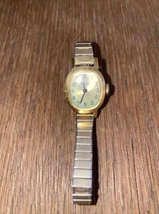 VINTAGE WIND UP TIMEX LADIES WRIST WATCH GOLD TONE 3/4"CASE THIN BAND NICE-RUNS - Picture 1 of 4