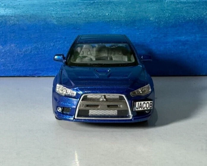 PLACAS PERSONALIZADAS Diecast Mitsubishi Lancer Evolution X 1:36 Modelo Niño En Caja Foto 1 de 4