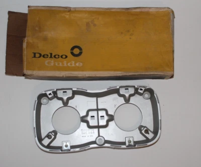 NOS 1966 GM OLDSMOBILE DELTA 88 LH HEADLIGHT HOUSING GUIDE 5957831 Foto 1 de 2