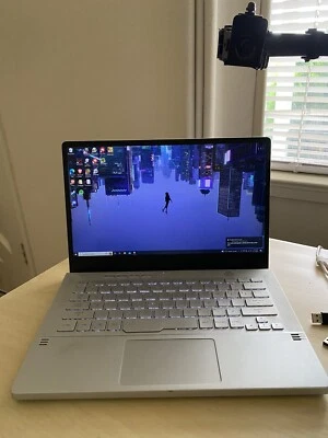 ASUS ROG Zephyrus G14 14'' (1TB SSD AMD Ryzen 9 5900HS RTX 3060 16GB RAM) - Image 1 of 4