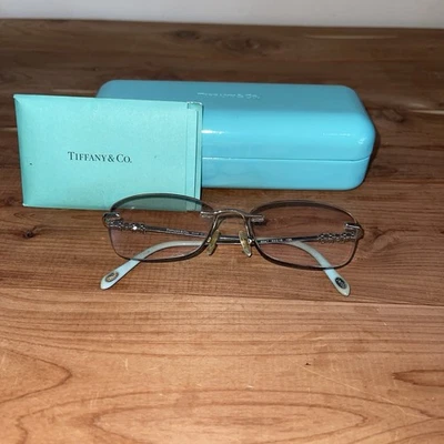 MARCOS DE GAFAS SIN MONTURA AUTÉNTICOS TIFFANY & CO. TF1110HB solo con estuche Foto 1 de 4
