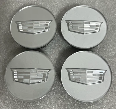 GENUINE OEM GM Cadillac center caps 9597375 , 9595439 Set of 4 - Image 1 of 4