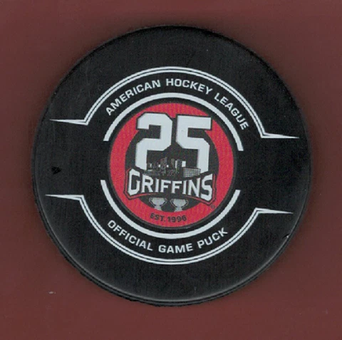 2021-2022 - AHL GAME PUCK GRAND RAPIDS GRIFFNS 25th ANNIVERSARY NO CUBE - LAST1 Cover