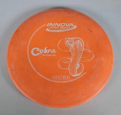 USED Innova DX Cobra 180g Orange Midrange Disc Golf Disc - Image 1 of 4