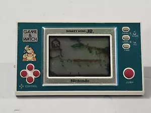Juego y reloj Nintendo Donkey Kong Jr. vintage 1982 portátil funcionando - Imagen 1 de 17