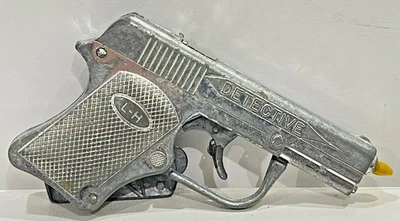 2709C ~ ¡Pistola de casquillo Leslie Henry Detective vintage de 5" años 60! Usado pero funciona Foto 1 de 2