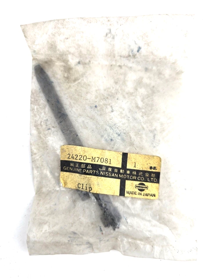 Arnés de cableado genuino Nissan 24220-M7081 clip de amarre 310 Pulsar NX Sentra NOS Foto 1 de 1