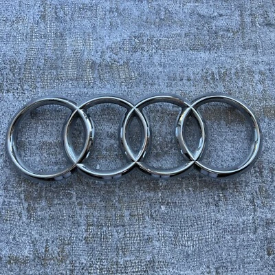 AUDI Q3 Q5 SQ5 Q7 A6 A7 S7 REJILLA DELANTERA ANILLOS EMBLEMA INSIGNIA LOGOTIPO 4H0853605B OEM Foto 1 de 4
